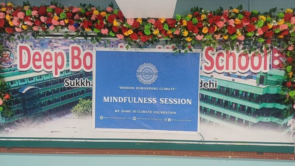 Mindfulness session banner at a school in Nepal